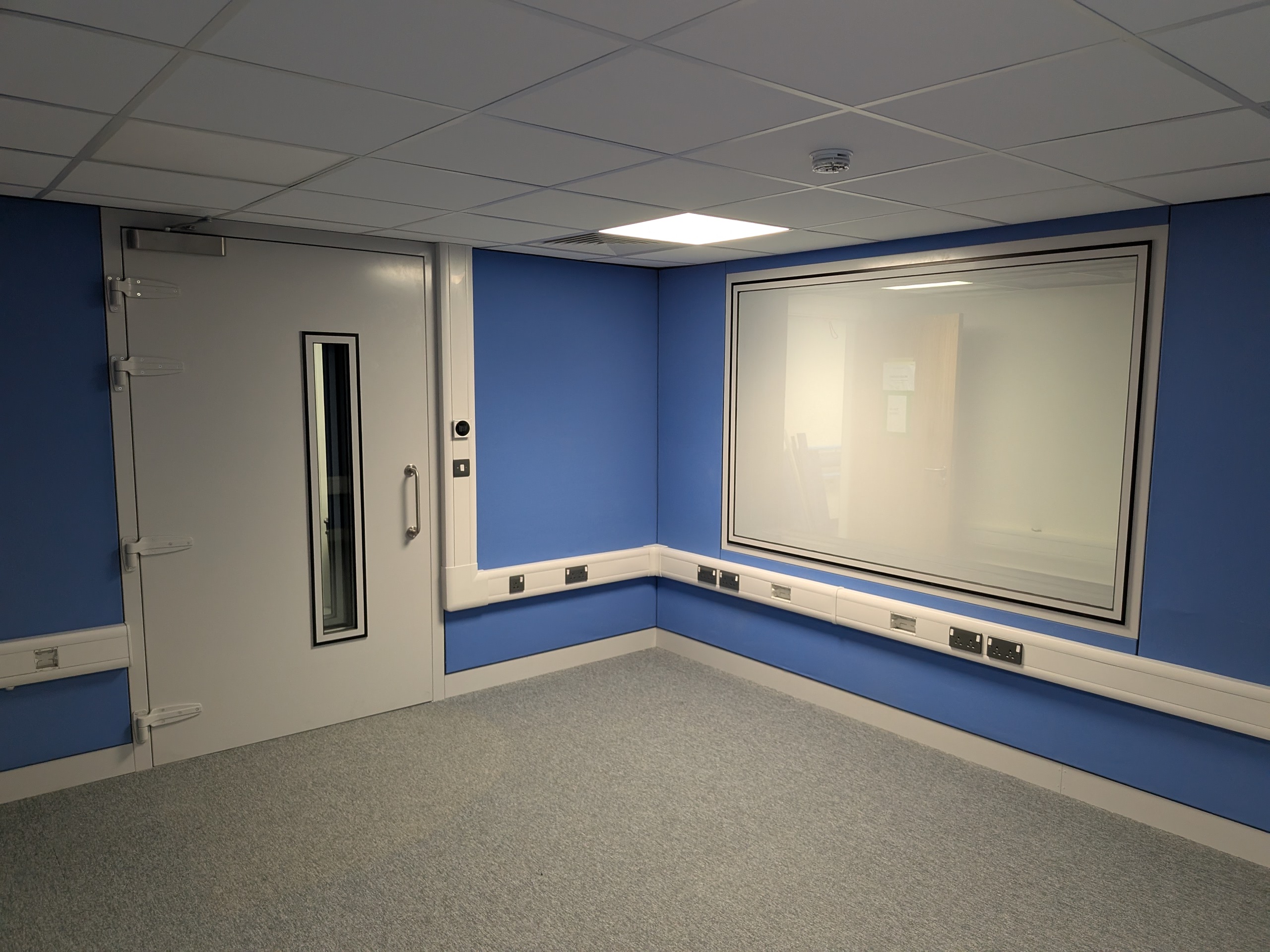 Soundproof door and observation windows in audiology room